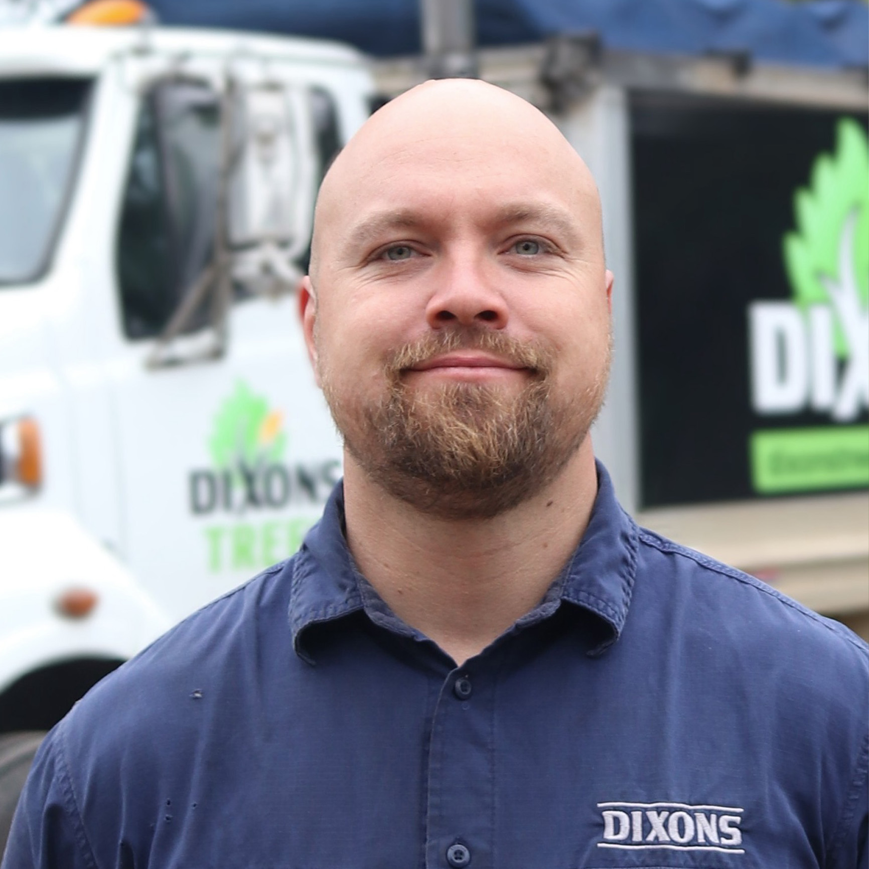Professional headshot of Alex Boland, a tree relocation expert representing Dixons Tree services in Sydney.